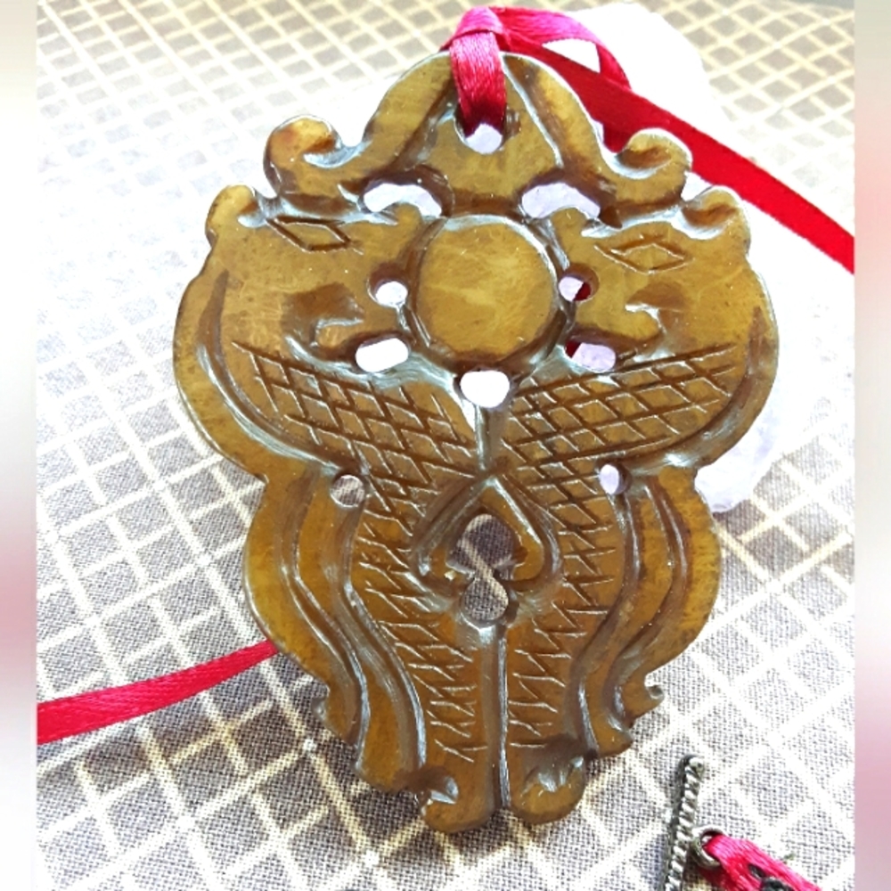 Large double dragon, stone pendent, possibly brown jade.